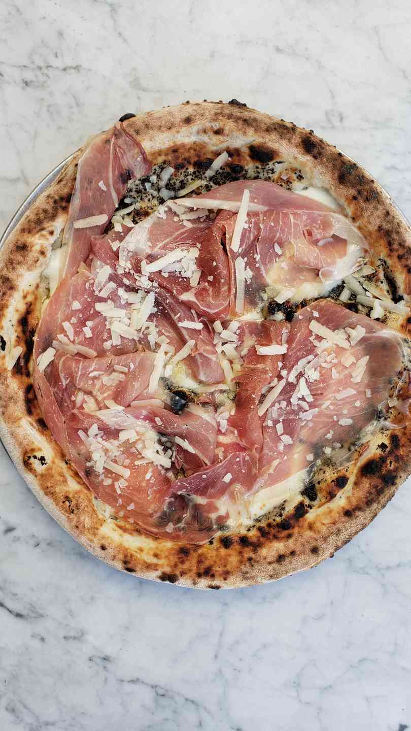 TRUFFLE PIZZA with bottle of wine