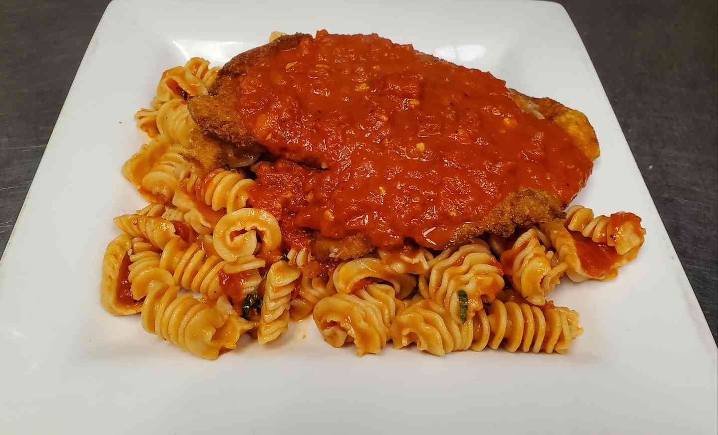 Eggplant, chicken or veal parmigiana