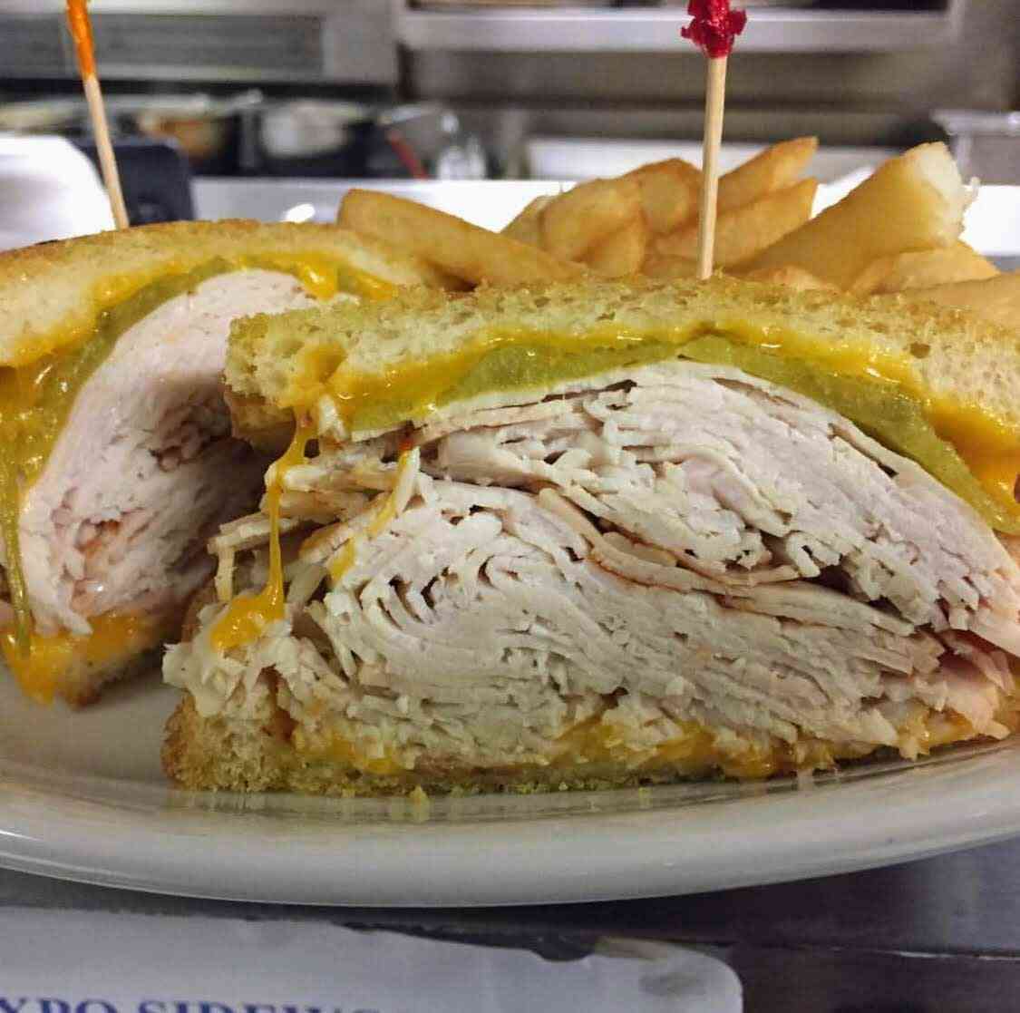 65. Roast beef or turkey Ortega melt