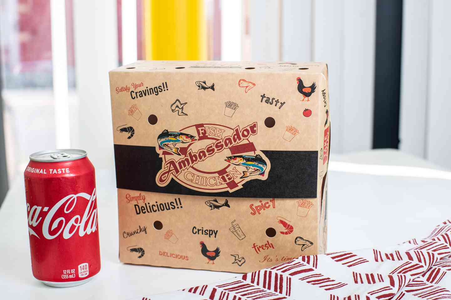 Packaged meal with a can of coke