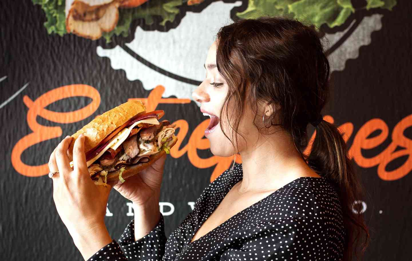 girl eating sandwich