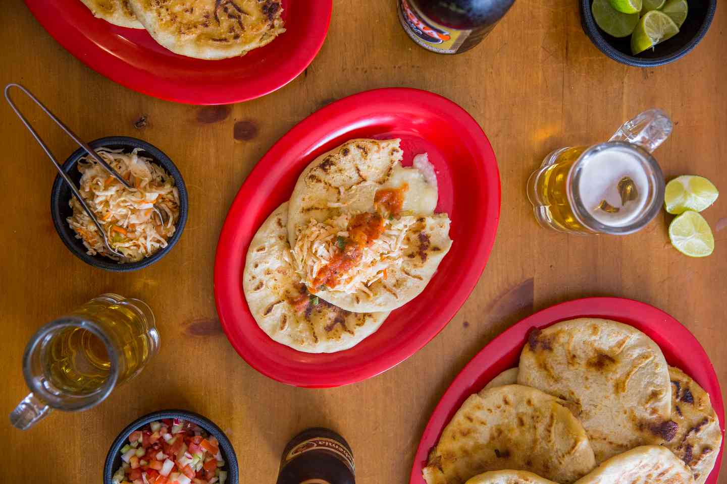 Aerial shot of pupusas and beer