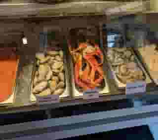 crab and mussels displayed in market