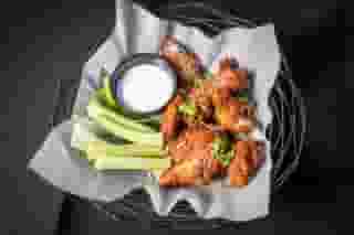 Chicken wings with celery and dip