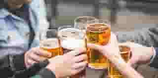 people toasting with drinks