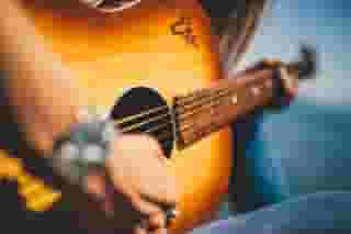 person playing guitar