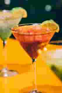Friends cheering with their drinks
