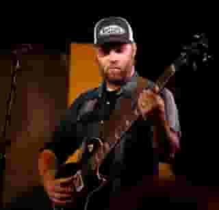 GS Harper "G.S. Harper's New Mexico Dirt is the real deal—just a man, his guitar, and his voice. And what a voice! Whether it's the title track's heartbreaking tale of a tractored-out farmer, the straight-from-the-horse's mouth ups and downs of a road musician's life in "Kids These Days," or the long-lost love remembrances of "Hearts on the Run," each piece is exquisitely crafted and delivered with the earnestness of a man who inhabits his stories as much as he tells them. If, in this age of overproduced, meaningless music, you're wondering what a real singer/songwriter sounds like, do yourself a favor and buy New Mexico Dirt—you'll find out real quick."Jason D. 'Diesel' Hamad Editor, No Surf Music 6pm - 9pm