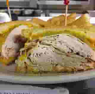 65. Roast beef or turkey Ortega melt