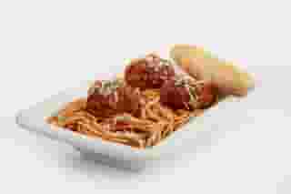 spaghetti and meatballs with breadstick