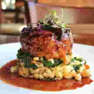 Veal Meatloaf with sautéed spaetzle, wilted kale, mushroom sauce