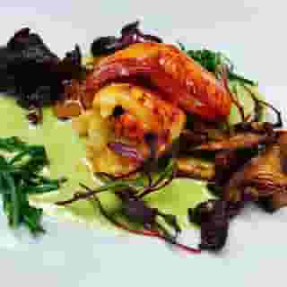 Butter poached lobster with sea beans, chanterelles, chervil lobster sauce