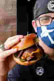 man holding a burger