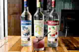 liquor bottles and custom cocktail