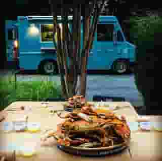 crabs with crab truck in back