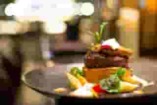 Fillet mignon served on puff pastry with mashed potatoes