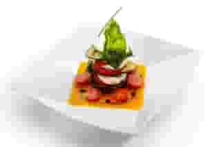 Fresh Mozzarella with tomato and mango dressing