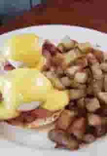Eggs Benedict with Irish Bacon and Homefries Breakfast Menu Friar