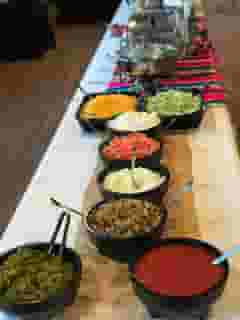 Table set up with various catered dishes