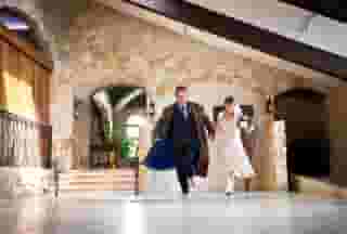 bride and groom running
