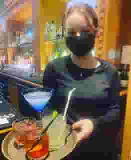 Staff serving a variety of cocktails