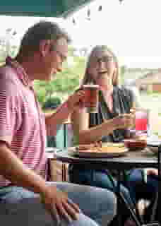 Patrons enjoying drinks and meals