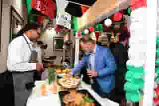 selecting appetizers from display table