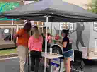 patrons at beer trailer