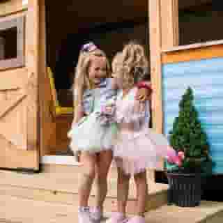 Two young girls in tutus