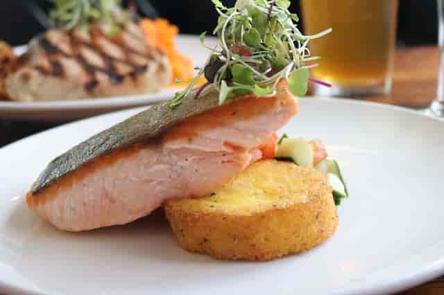 Pan seared salmon with polenta cake
