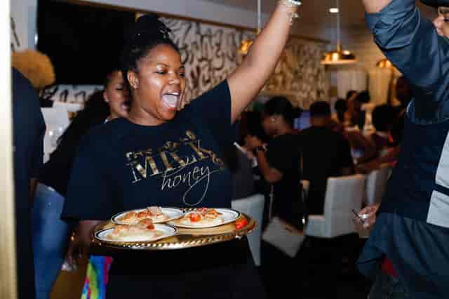 waitress holding food