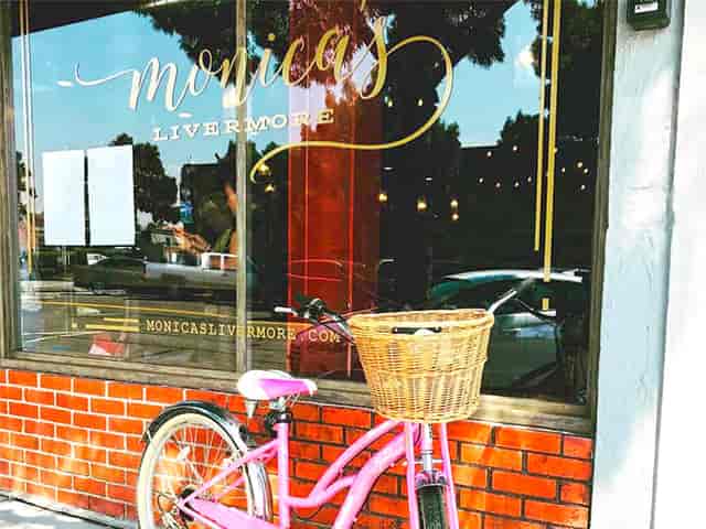 exterior of Monica's with bike