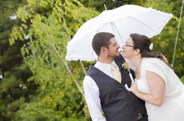 wedding couple with umbrella
