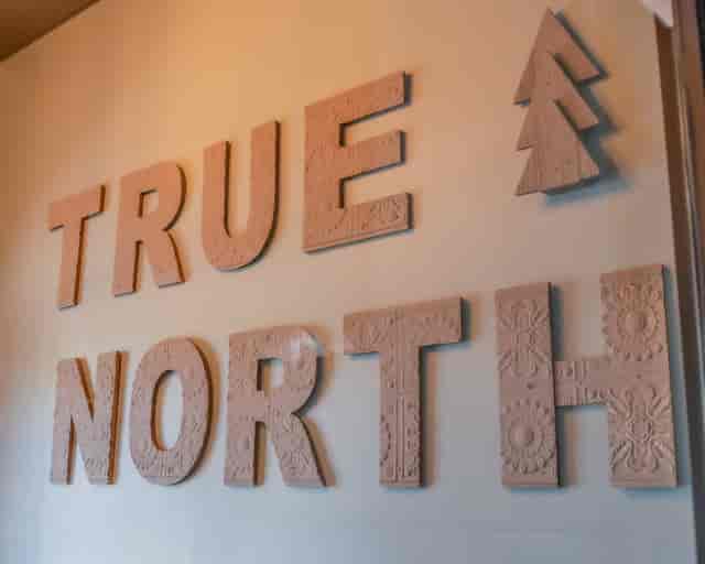 True North wall signage
