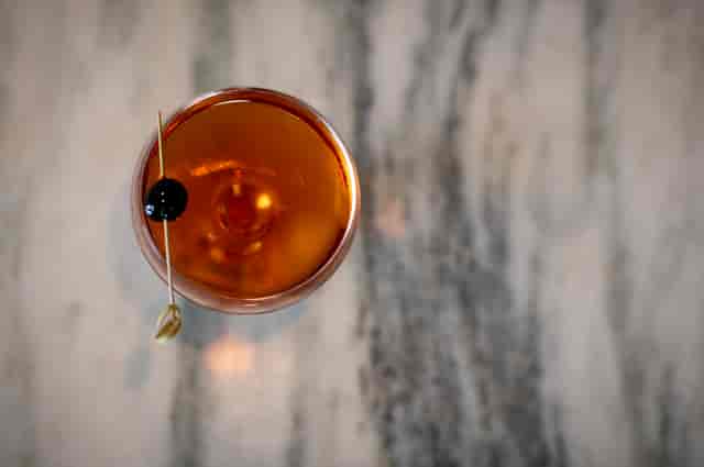 pouring liquor in a glass