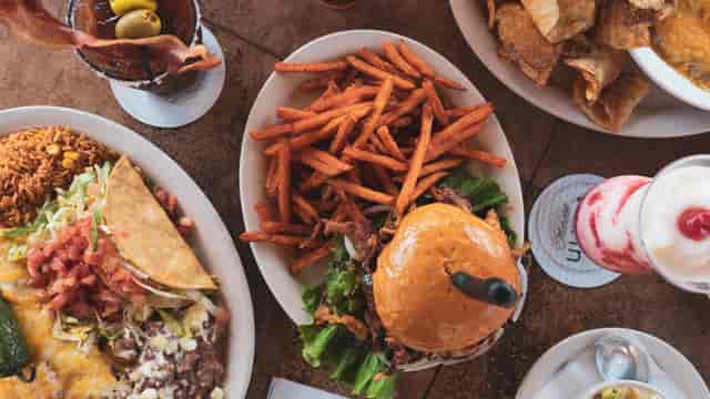 burger and fries and various foods