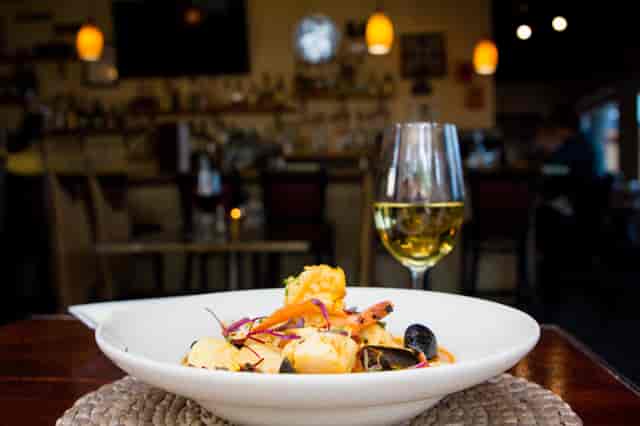 clam dish and wine