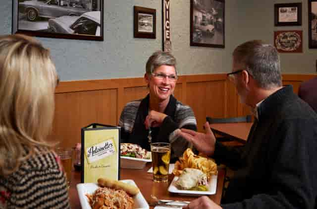 three people dining at a table