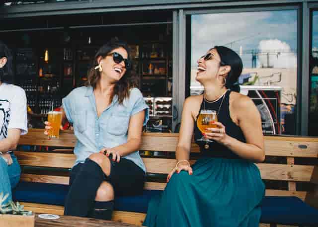 two women on bench