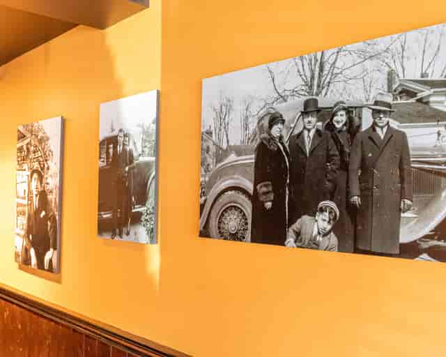 Our History header image of old black and white family portraits
