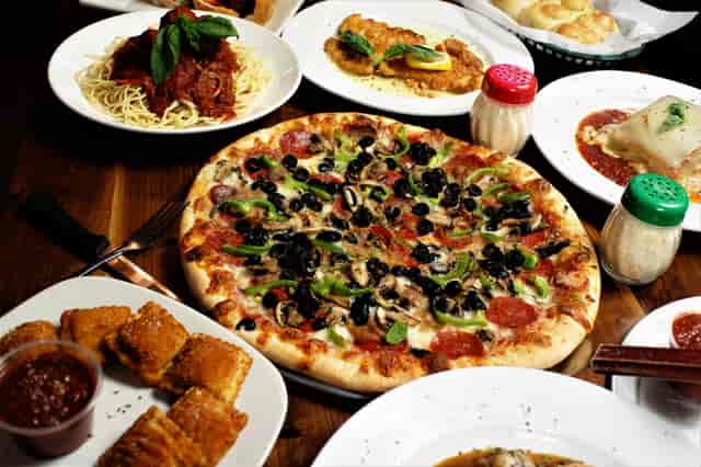 Variety of dishes at Milanias NY Pizza
