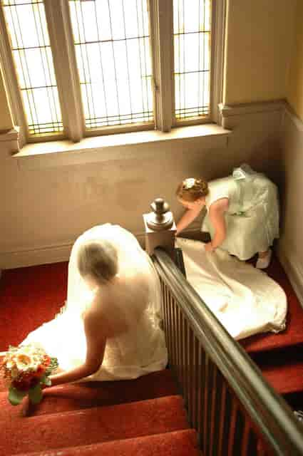 Bride walking down stairs