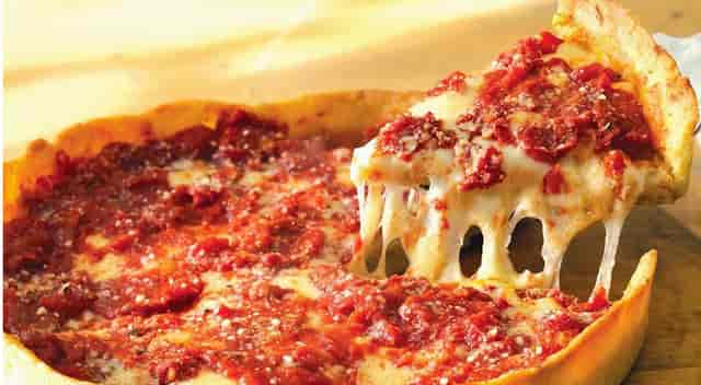 serving a slice of deep dish