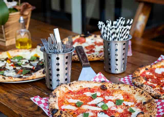 Multiple different pizzas