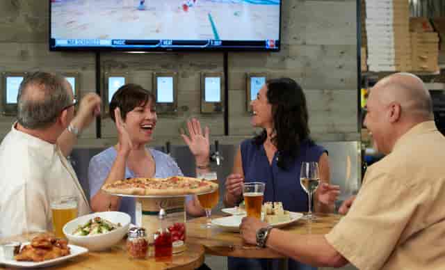 people eating pizza