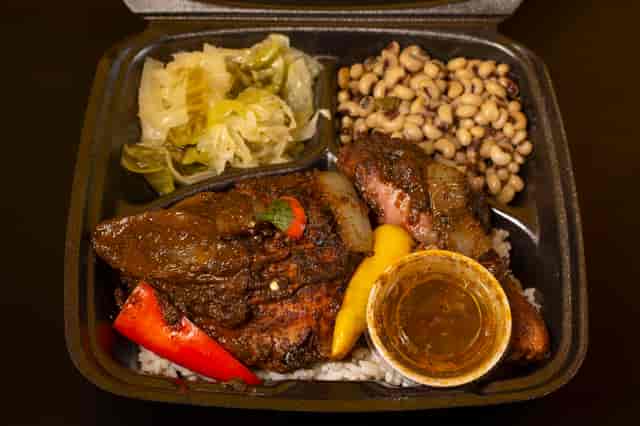 Jerk Chicken Black-eyed Peas and Stewed Cabbage