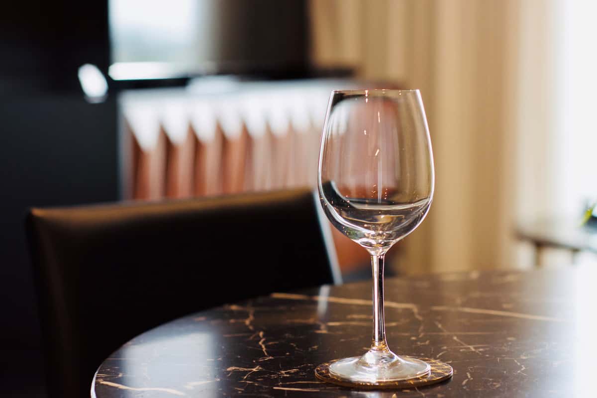 wine glass on marble table stock image