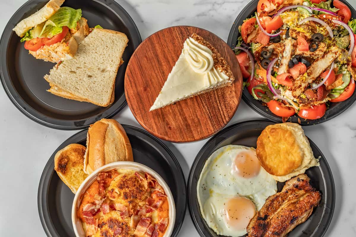 Breakfast, lunch and desserts on a table