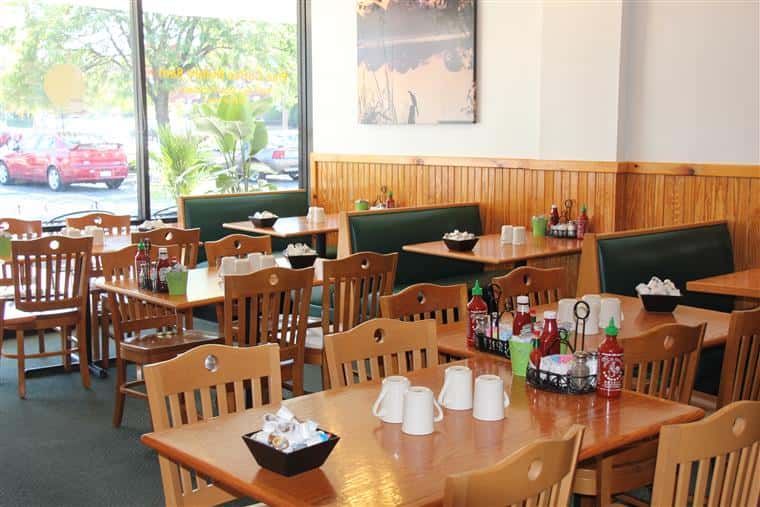 tables and booths inside restaurant