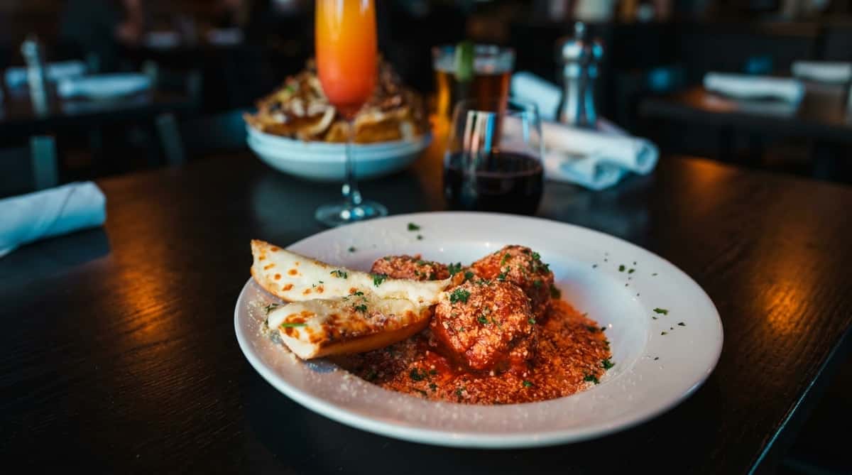 Classic Italian-style pasta with marinara sauce and garlic bread at Oak & Pie in Wichita, KS